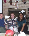 Cozy in the fireplace pit! (L-R: Tom, Jennie & Nabilla)