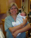 Adeline Olivia Elsbeth Schmidt arrives at 6:13 am on July 13, 2005
8 lbs 13 oz, 22 inches (with Dr. Weihs who delivered Adi)